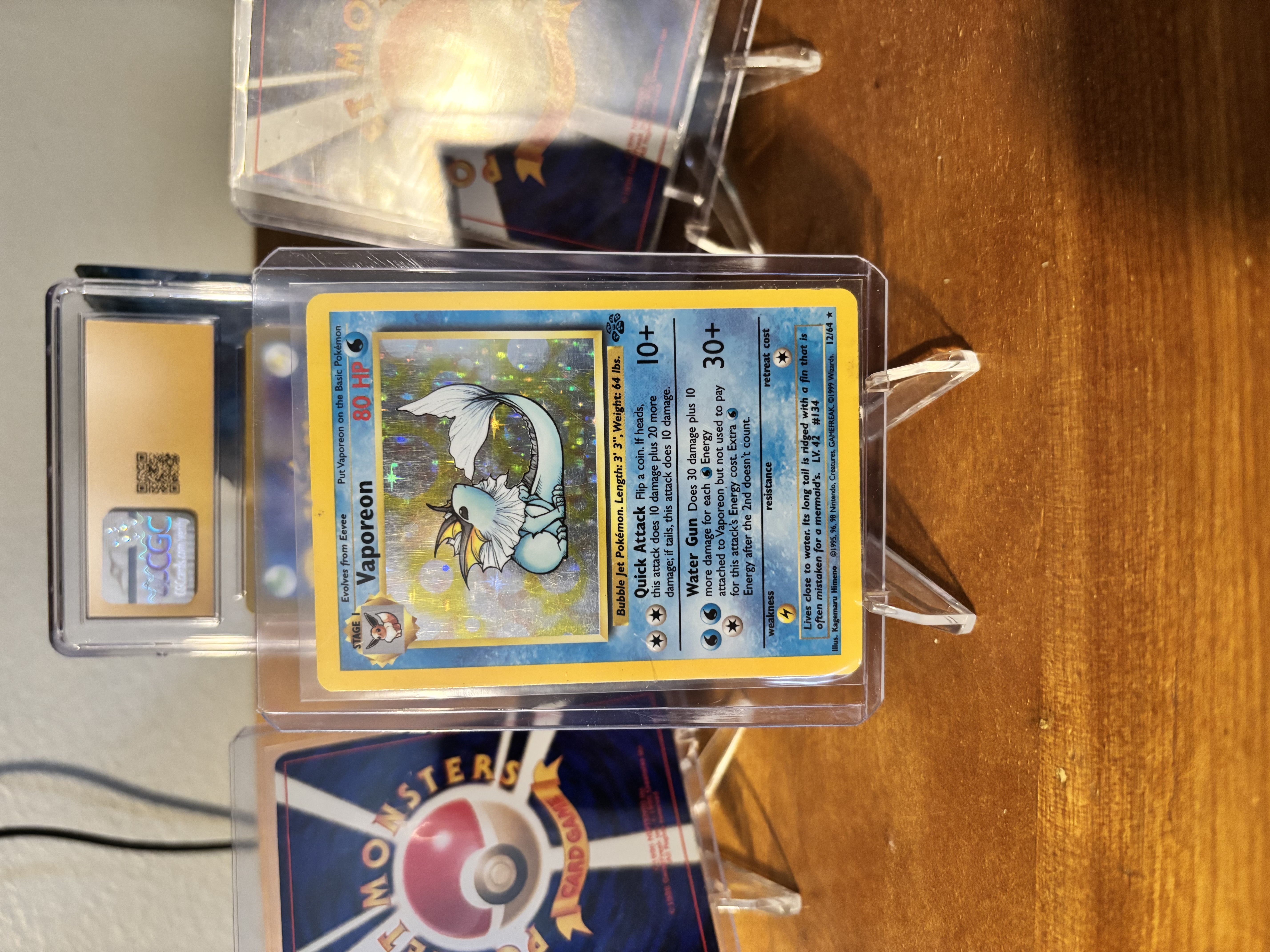1999 Jungle Vaporeon Holo 12/64 – Vintage WOTC Pokémon – Played